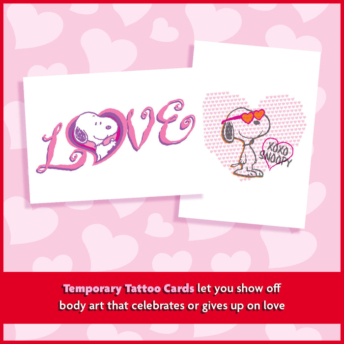 Temporary tattoo cards with Snoopy designs on a pink heart patterned background